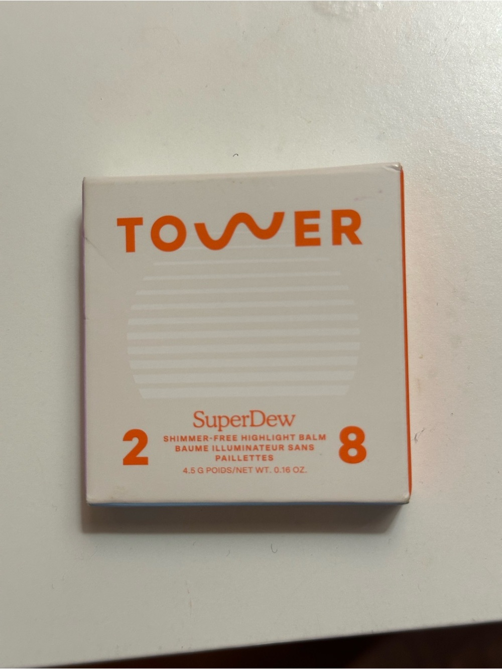 Tower 28 Shimmer-Free Highlight Balm — White & Orange Packaging